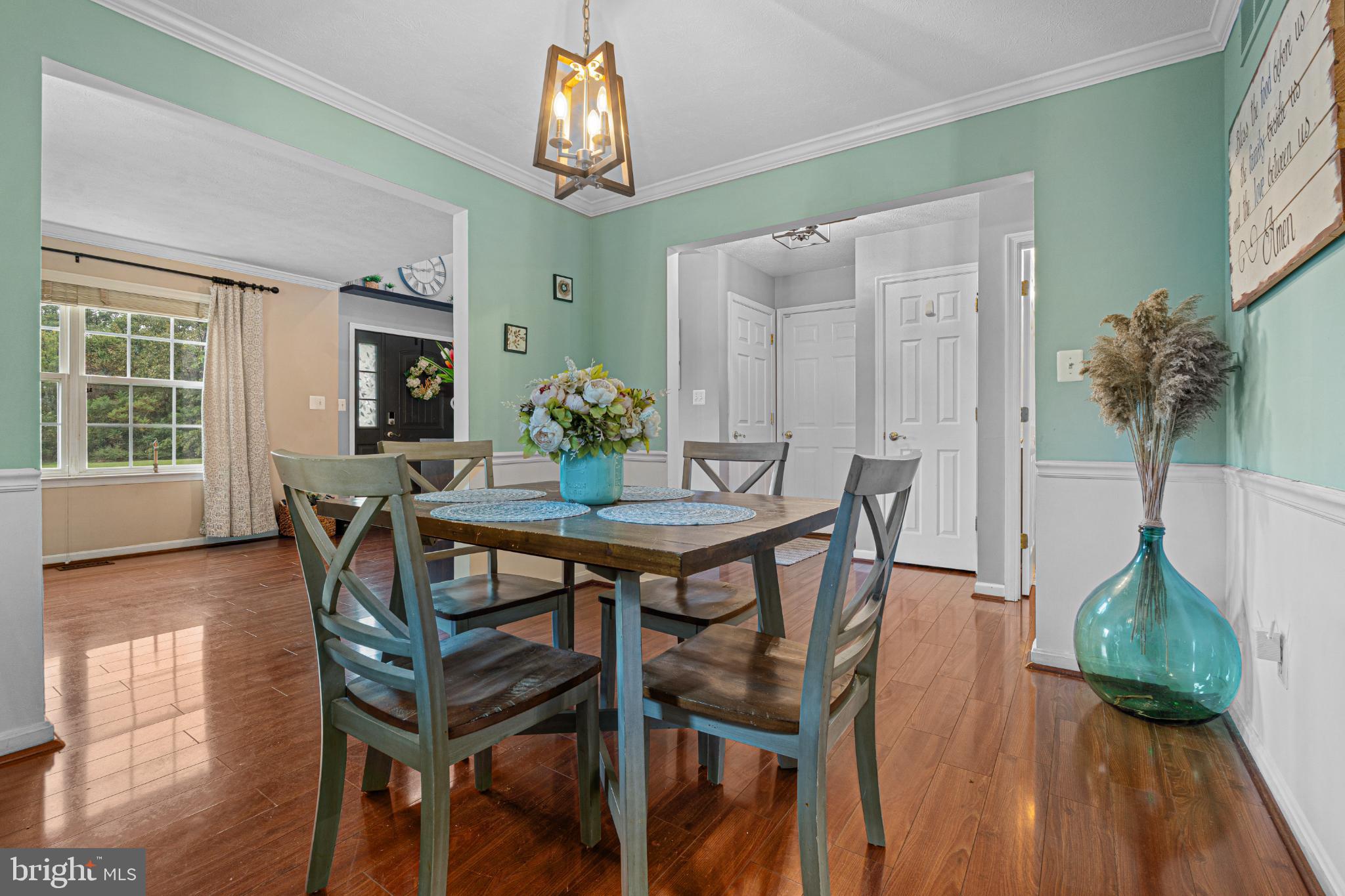 4635 Greencove Circle Sparrows Point, MD 21219 - Photo 14 of 48 a view of a dining room with furniture and wooden floor
