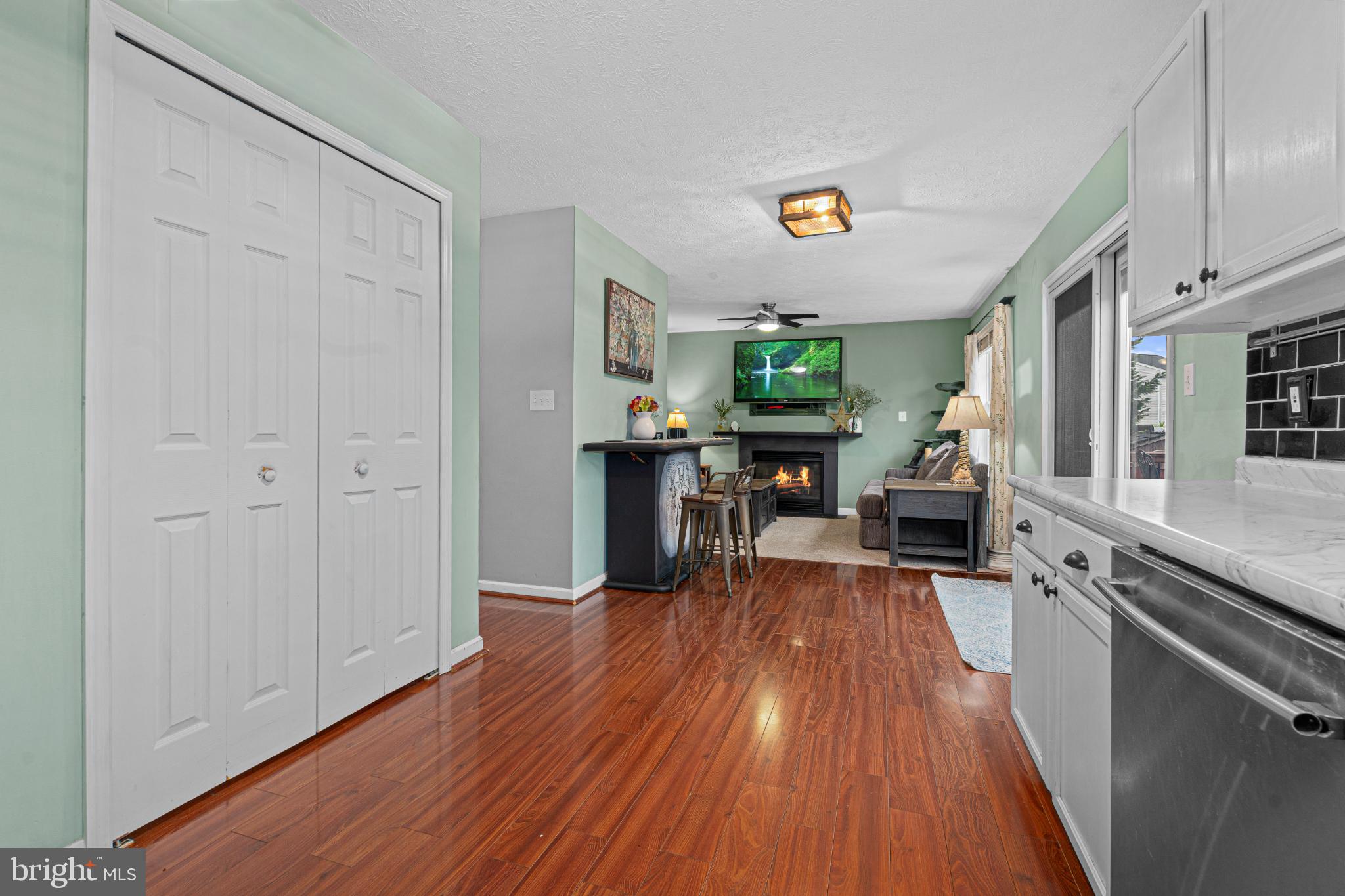4635 Greencove Circle Sparrows Point, MD 21219 - Photo 20 of 48 a living room with furniture wooden floor and a table