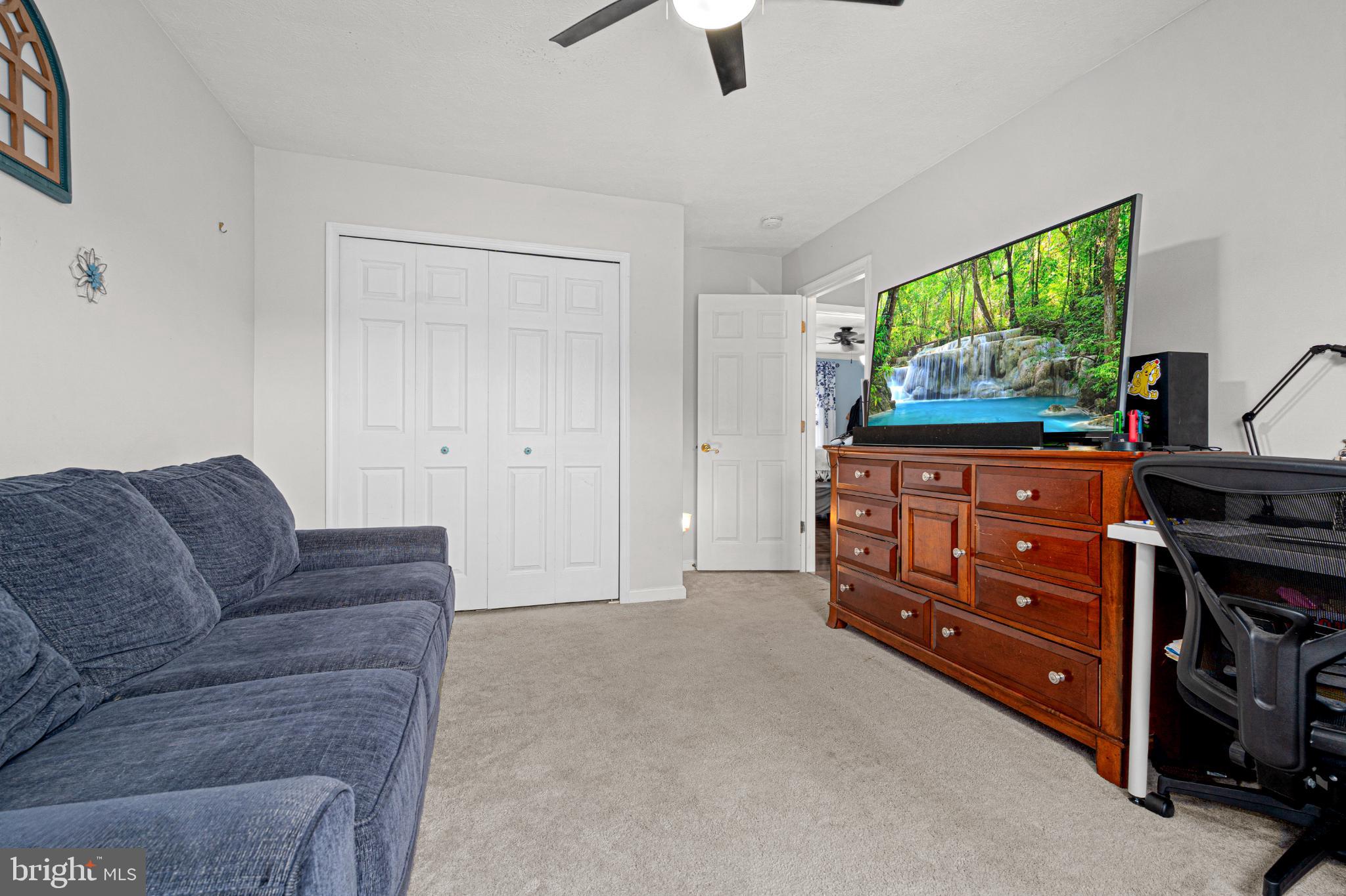 4635 Greencove Circle Sparrows Point, MD 21219 - Photo 24 of 48 a living room with furniture and a flat screen tv