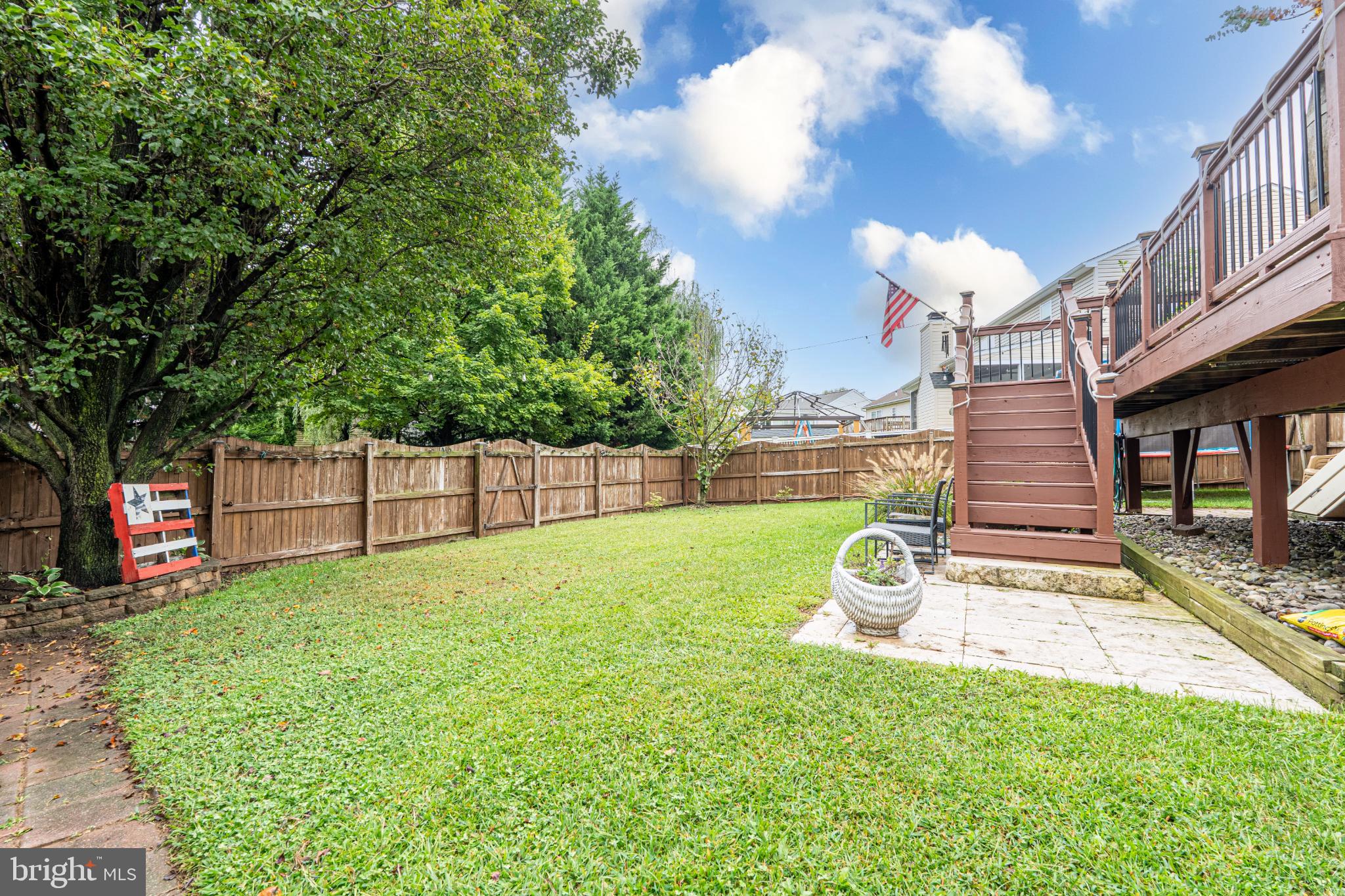 4635 Greencove Circle Sparrows Point, MD 21219 - Photo 42 of 48 a view of a backyard with a garden and entertaining space