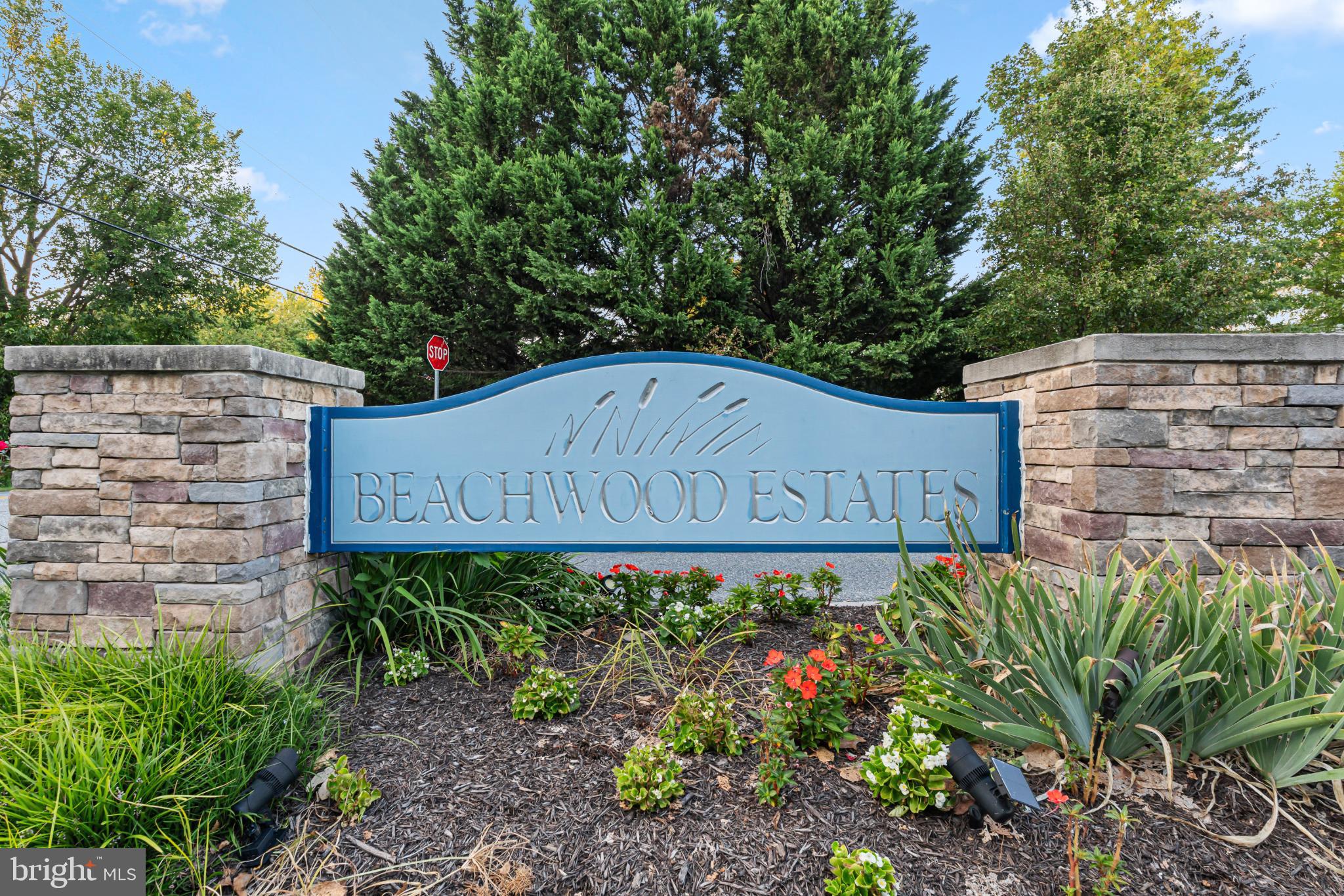 4635 Greencove Circle Sparrows Point, MD 21219 - Photo 6 of 48 a sign that is sitting in front of flowers