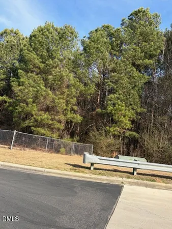 a view of a building with a road
