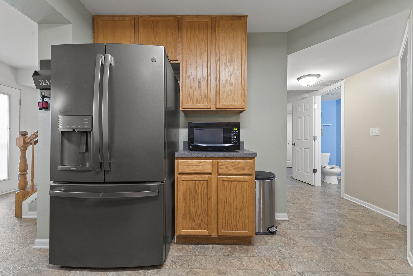 1840 Spinnaker Street Pingree Grove, IL 60140 - Photo 13 of 25 a kitchen with stainless steel appliances granite countertop a refrigerator and a stove