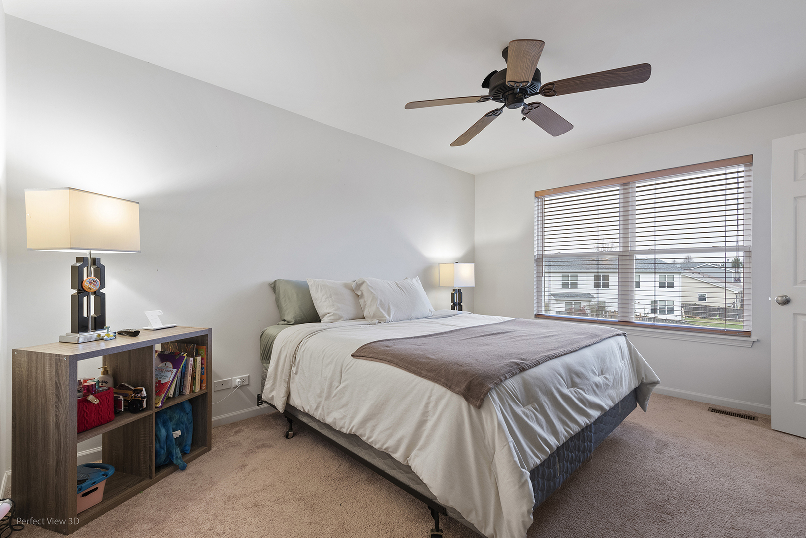1840 Spinnaker Street Pingree Grove, IL 60140 - Photo 15 of 25 a bedroom with a bed and a chandelier