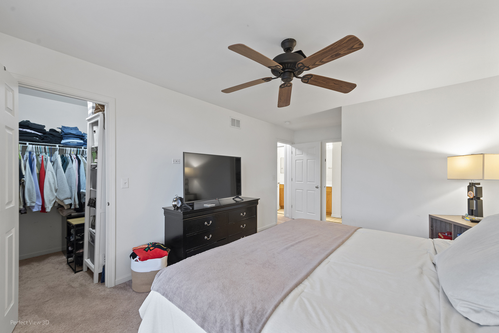 1840 Spinnaker Street Pingree Grove, IL 60140 - Photo 16 of 25 a bedroom with a bed and a flat screen tv