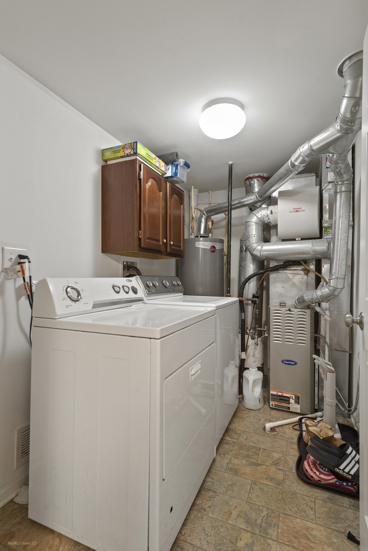 1840 Spinnaker Street Pingree Grove, IL 60140 - Photo 24 of 25 a utility room with dryer and washer