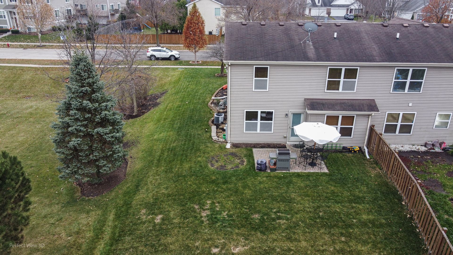1840 Spinnaker Street Pingree Grove, IL 60140 - Photo 4 of 25 a aerial view of a house with garden space and a lake view