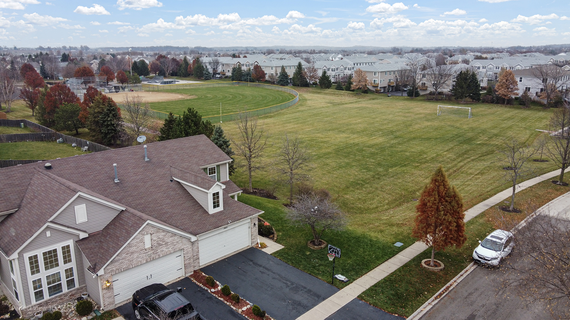 1840 Spinnaker Street Pingree Grove, IL 60140 - Photo 5 of 25 an aerial view of residential houses with outdoor space and ocean view
