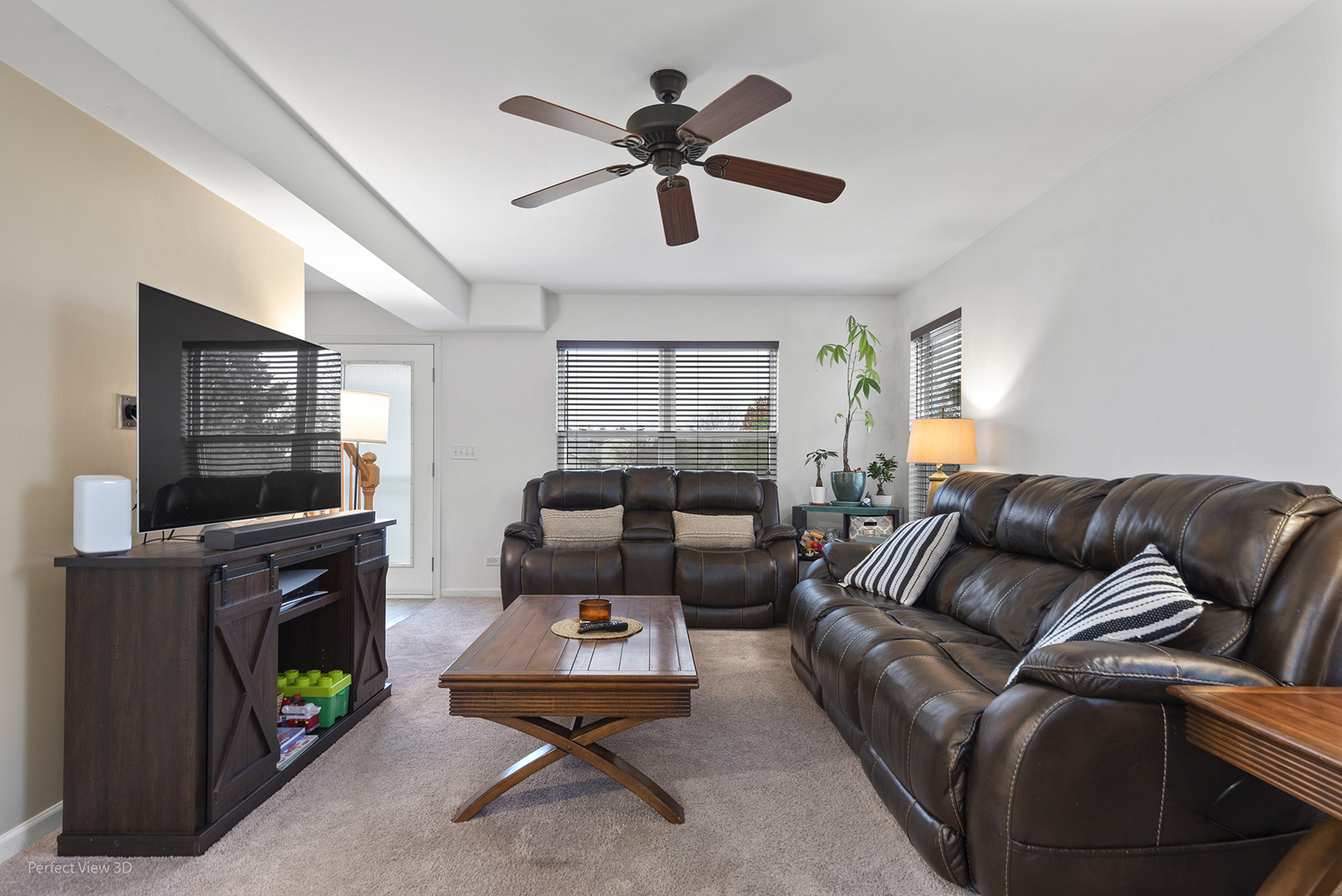 1840 Spinnaker Street Pingree Grove, IL 60140 - Photo 10 of 25 a living room with furniture and a fireplace