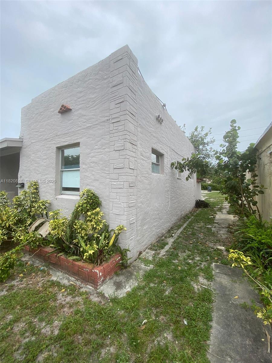 2014 Funston Street Hollywood, FL 33020 - Photo 1 of 5 front view of a house with a yard