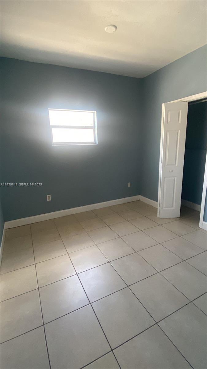 2014 Funston Street Hollywood, FL 33020 - Photo 4 of 5 a view of an empty room with a window