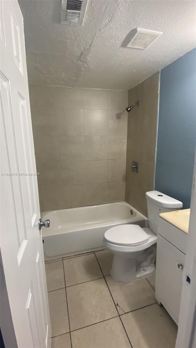 2014 Funston Street Hollywood, FL 33020 - Photo 5 of 5 a bathroom with a toilet a sink and a bathtub