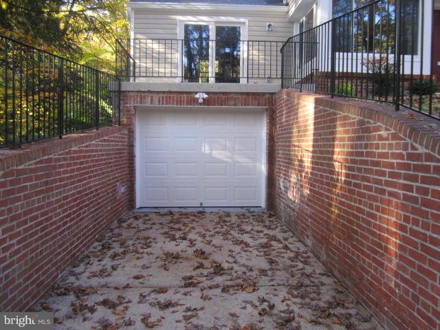 109 Sunnyside Road Silver Spring, MD 20910 - Photo 14 of 23 a view of a pathway along the house