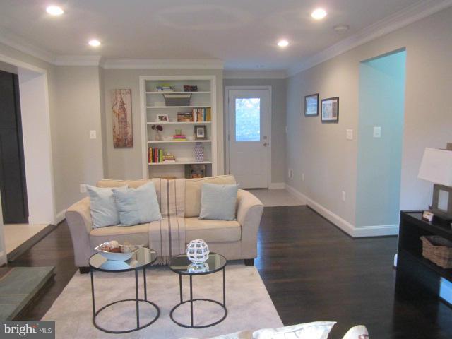 109 Sunnyside Road Silver Spring, MD 20910 - Photo 3 of 23 a living room with furniture and a hard wood floor