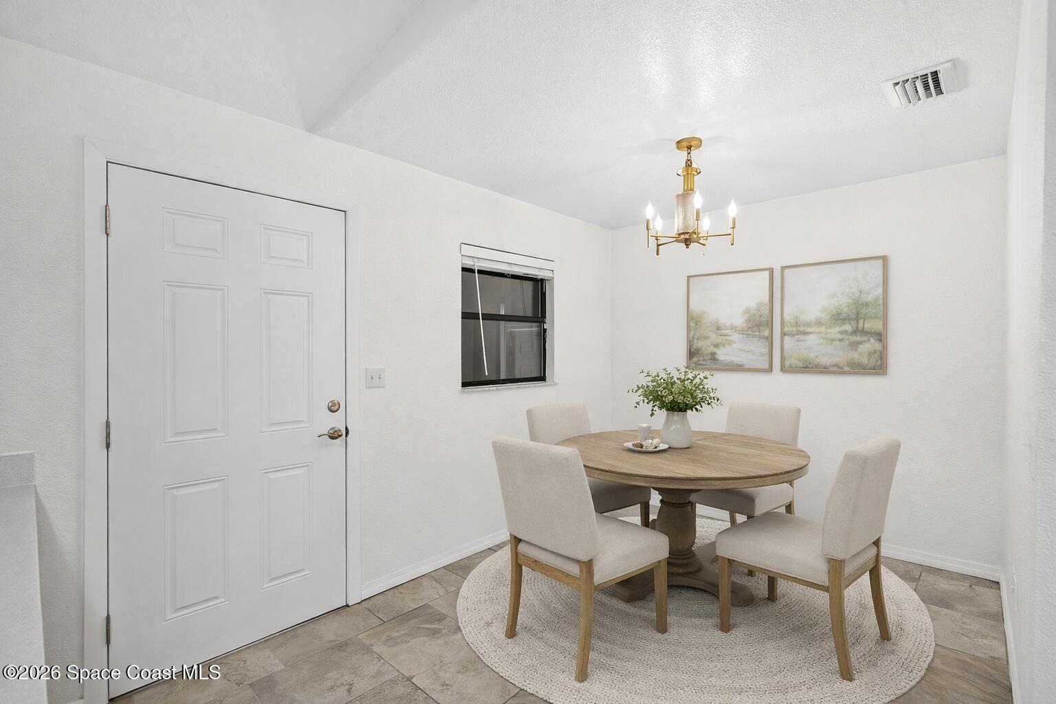 5 Lee Street Cocoa, FL 32926 - Photo 11 of 29 a dining room with furniture and window