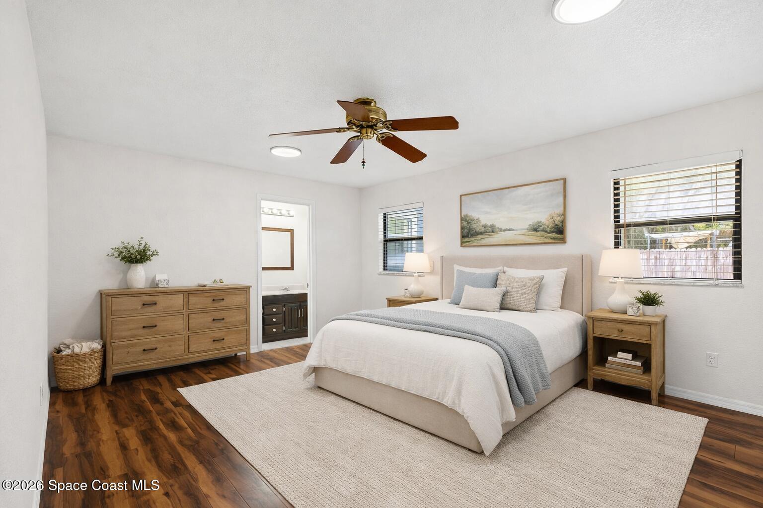 5 Lee Street Cocoa, FL 32926 - Photo 12 of 29 a bedroom with a bed dresser and a window