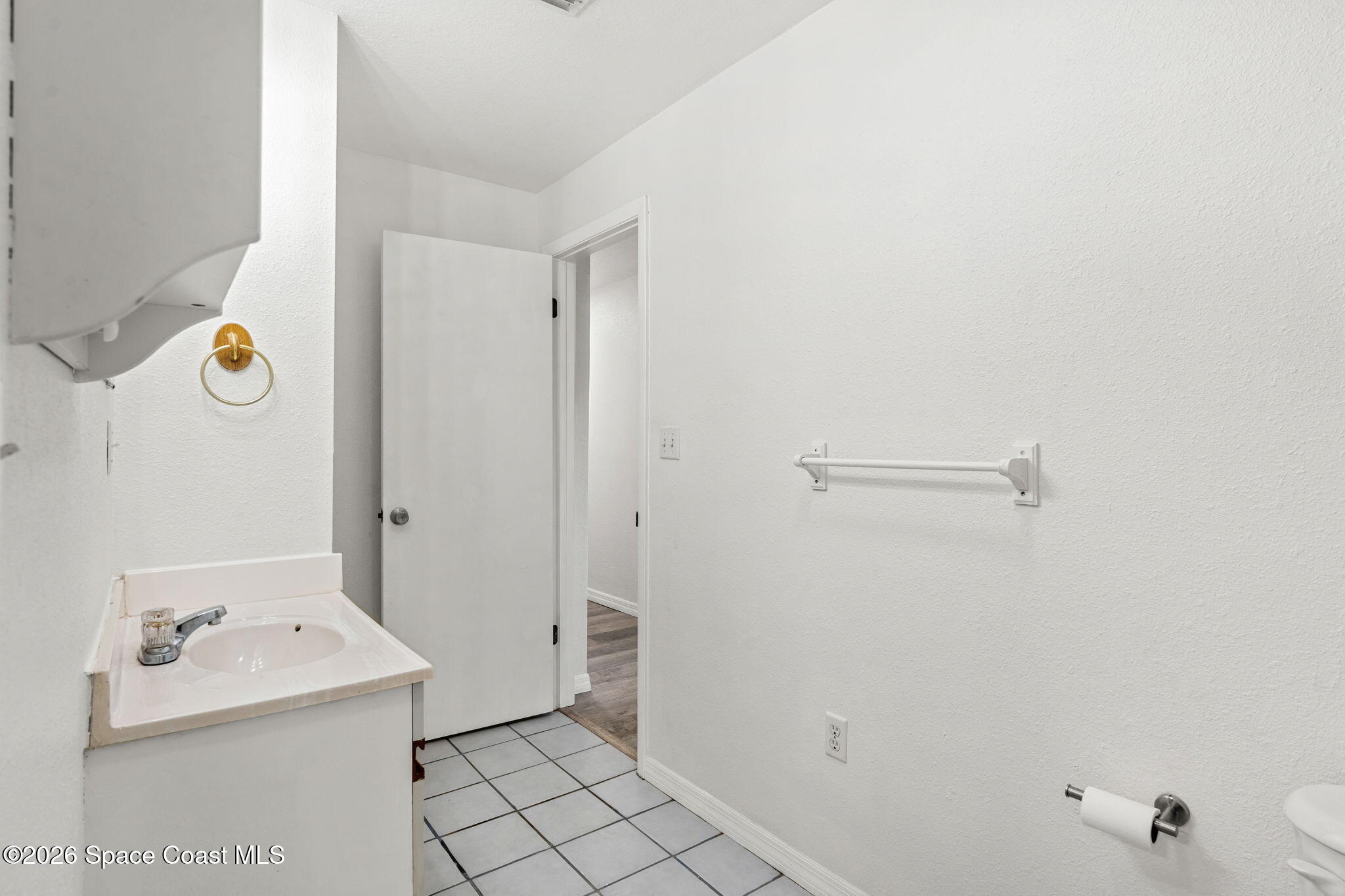 5 Lee Street Cocoa, FL 32926 - Photo 19 of 29 a bathroom with a sink and a shower