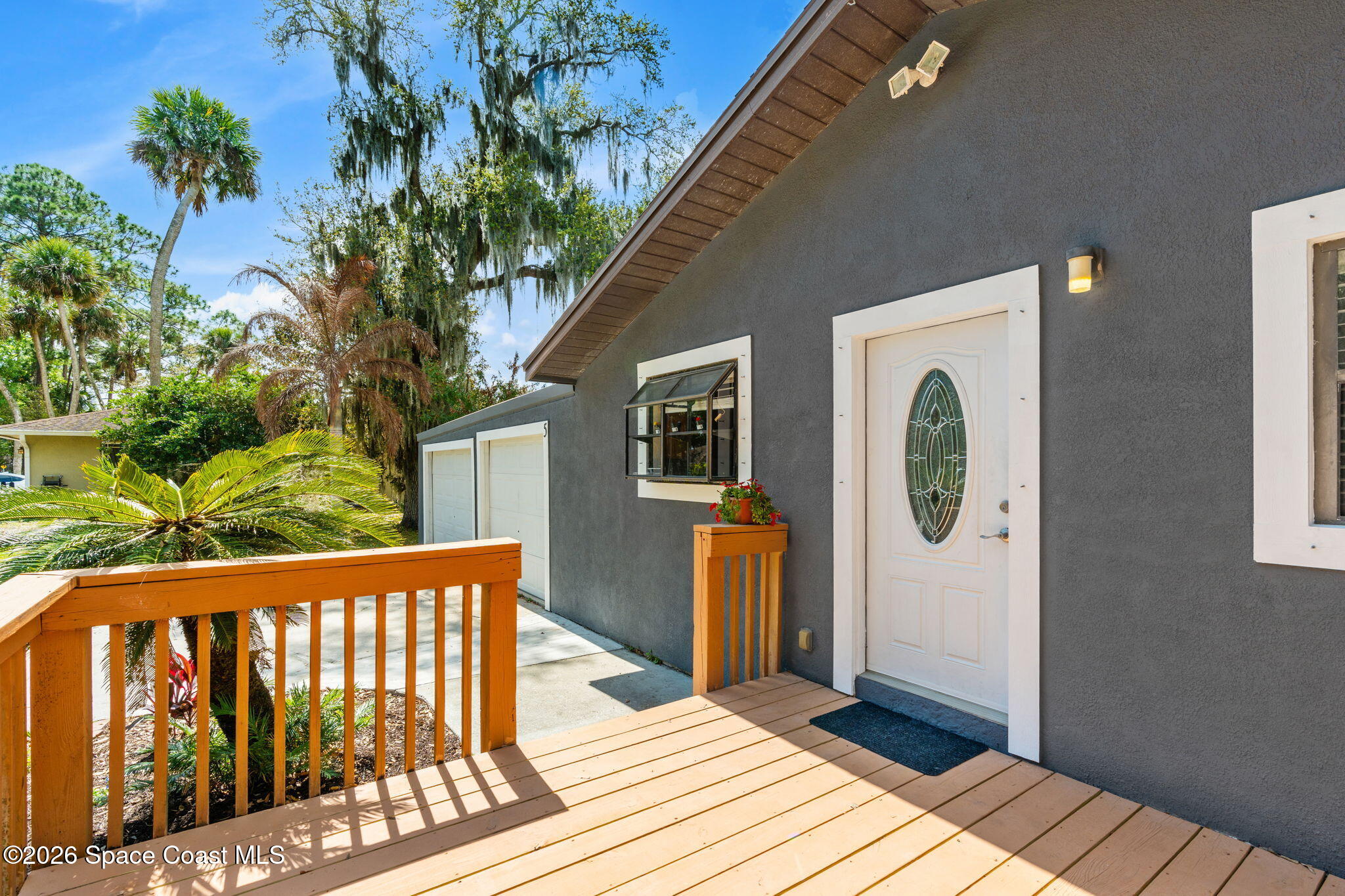 5 Lee Street Cocoa, FL 32926 - Photo 2 of 29 a front view of a house with garden