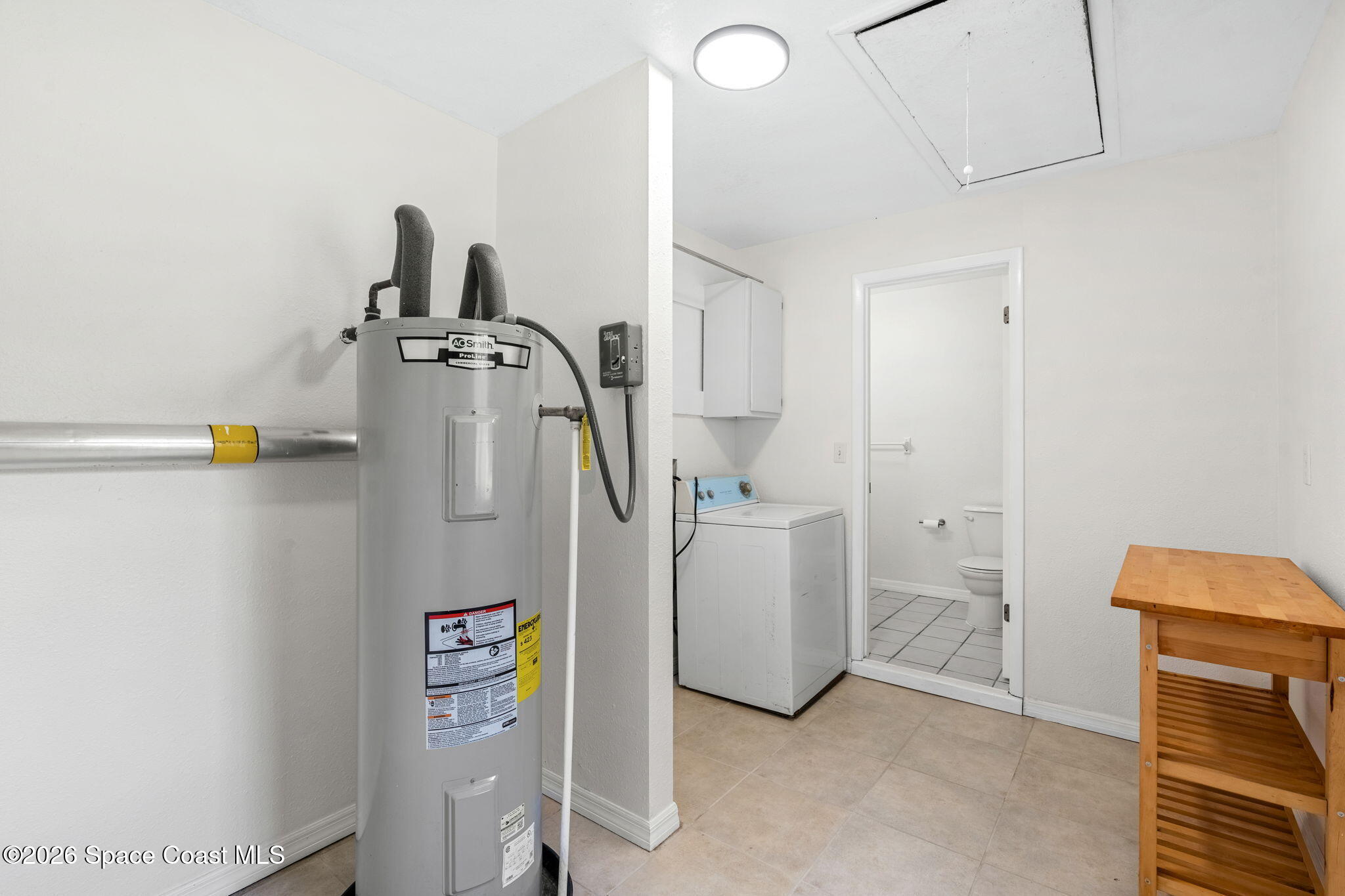 5 Lee Street Cocoa, FL 32926 - Photo 21 of 29 a utility room with dryer and washer