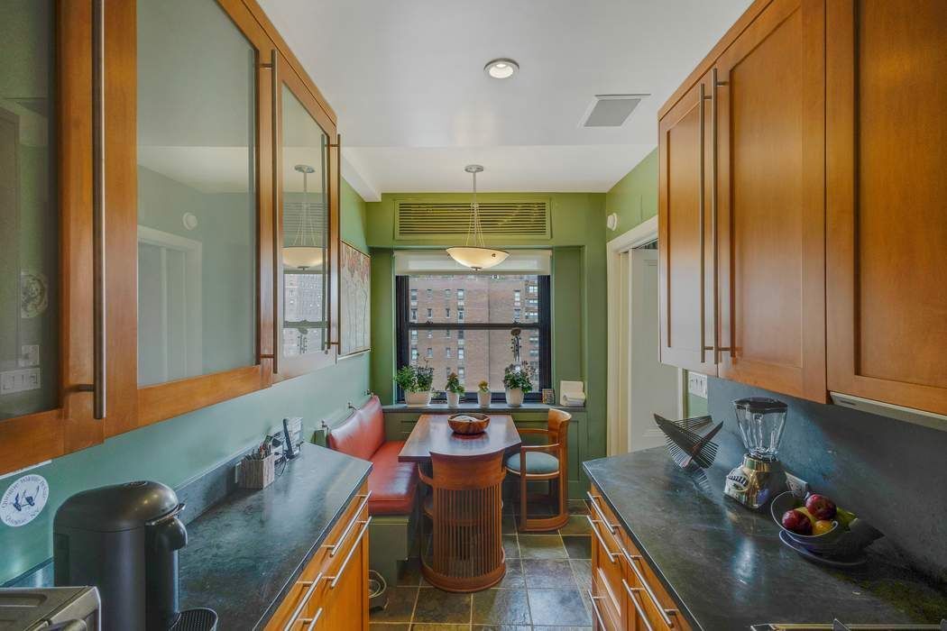 139 East 94th Street, Unit 11CD Manhattan, NY 10128 - Photo 12 of 28 a view of a dining room with furniture window and outside view