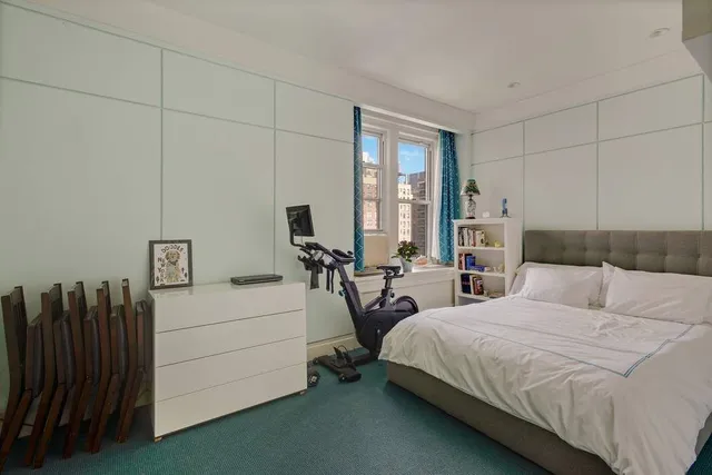 a kitchen with a sink and large window