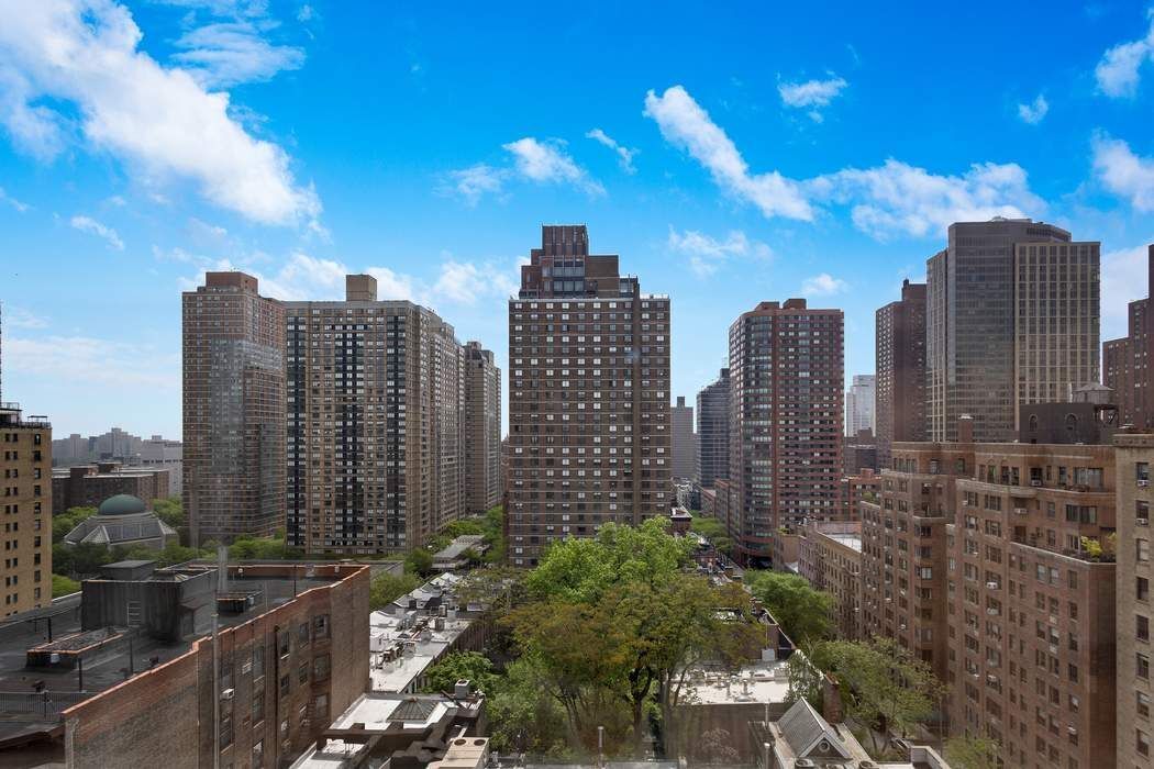 139 East 94th Street, Unit 11CD Manhattan, NY 10128 - Photo 26 of 28 a view of a city with tall buildings