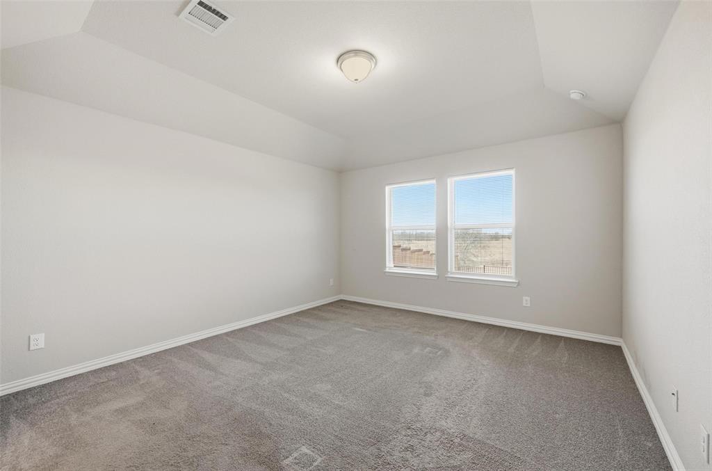 1116 Rountree Court Celina, TX 75009 - Photo 21 of 29 an empty room with a window