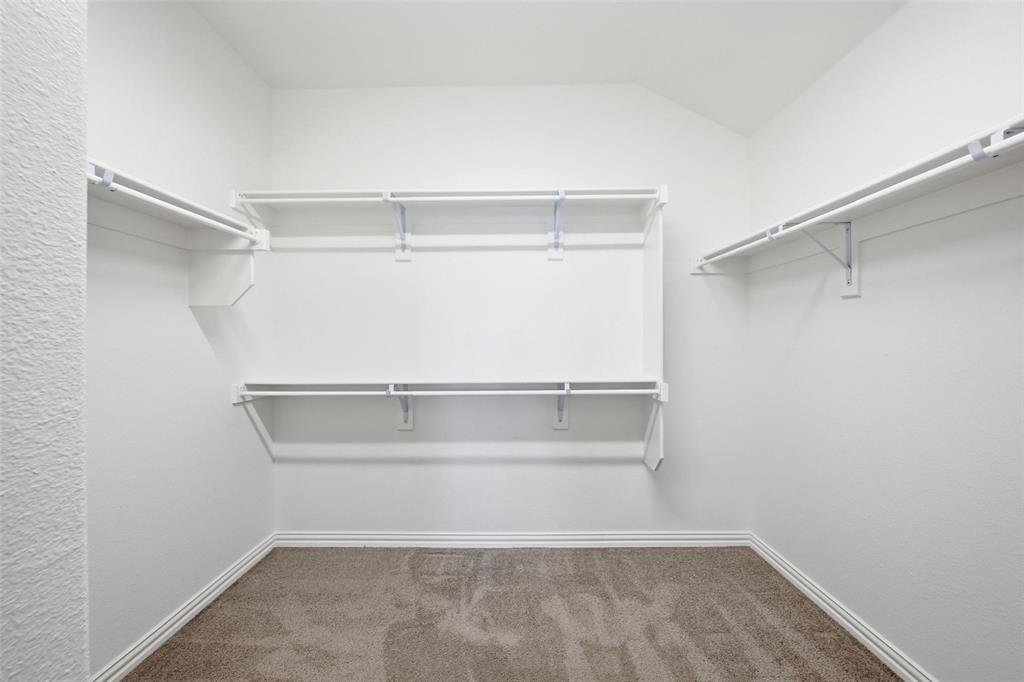 1116 Rountree Court Celina, TX 75009 - Photo 25 of 29 a view of an empty walk in closet