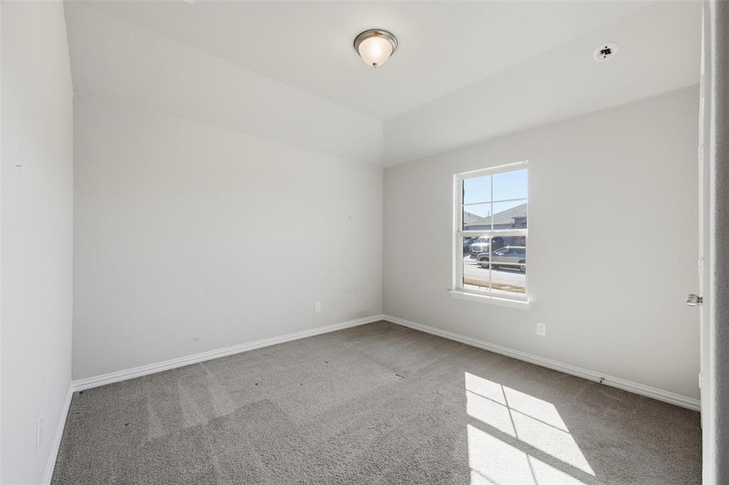 1116 Rountree Court Celina, TX 75009 - Photo 5 of 29 an empty room with a window