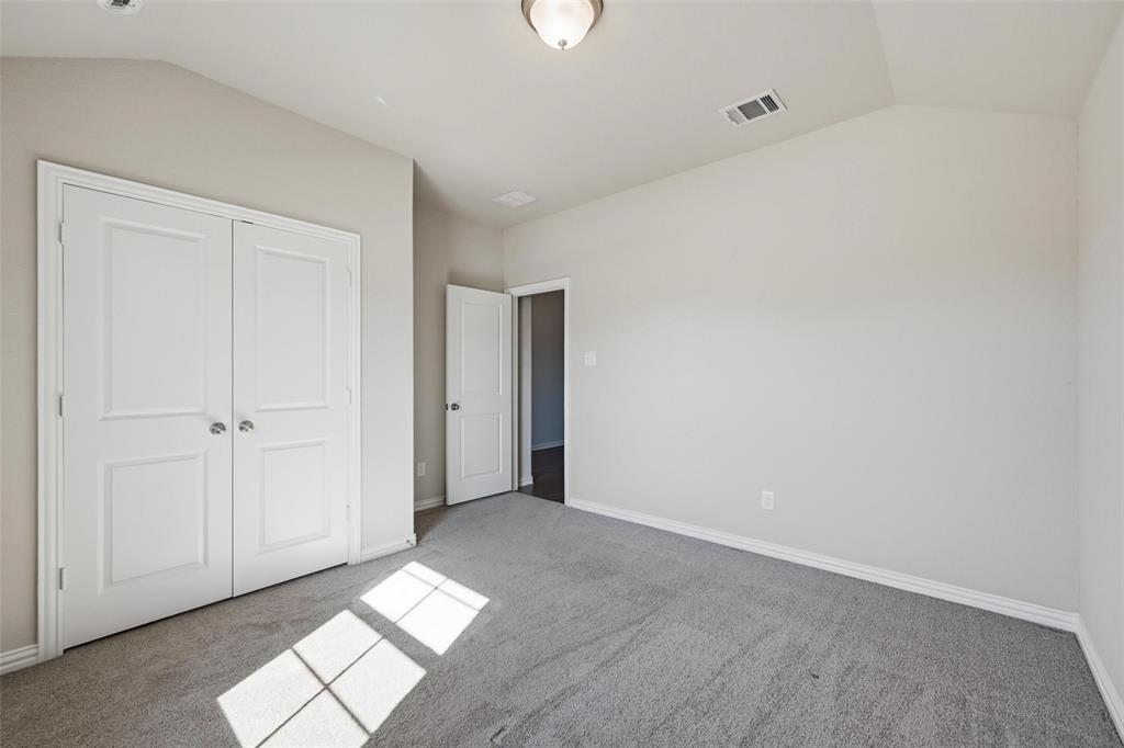 1116 Rountree Court Celina, TX 75009 - Photo 6 of 29 a view of empty room with window