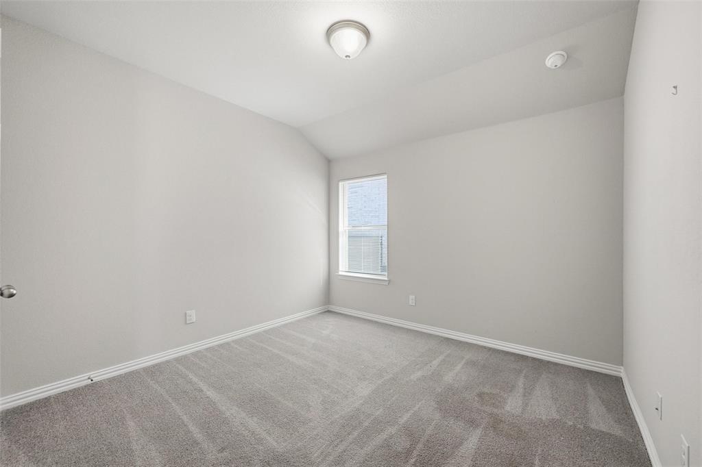 1116 Rountree Court Celina, TX 75009 - Photo 7 of 29 a view of an empty room with a window