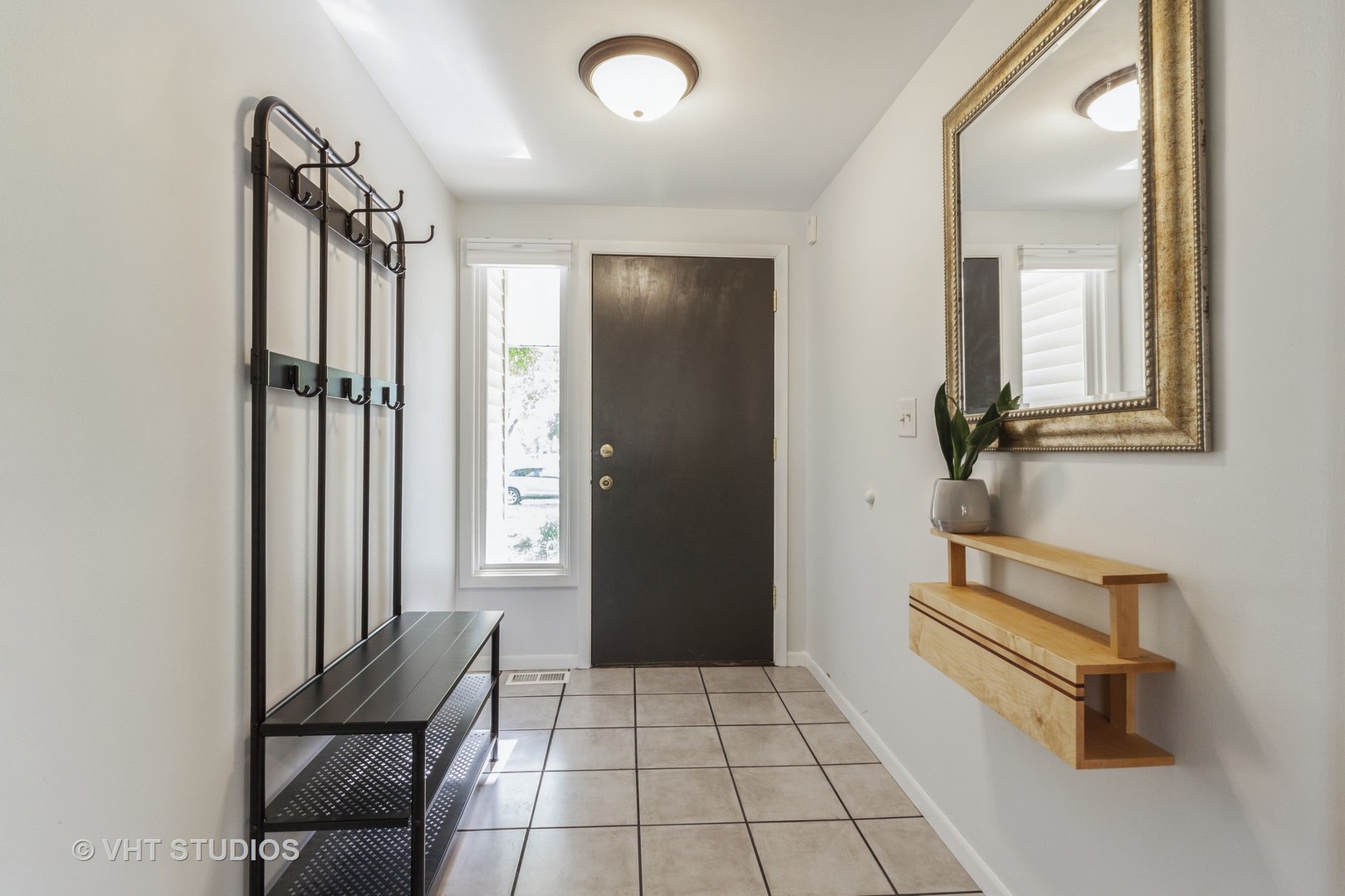 105 Cedarbrook Road Naperville, IL 60565 - Photo 2 of 11 a view of a hallway with elevator