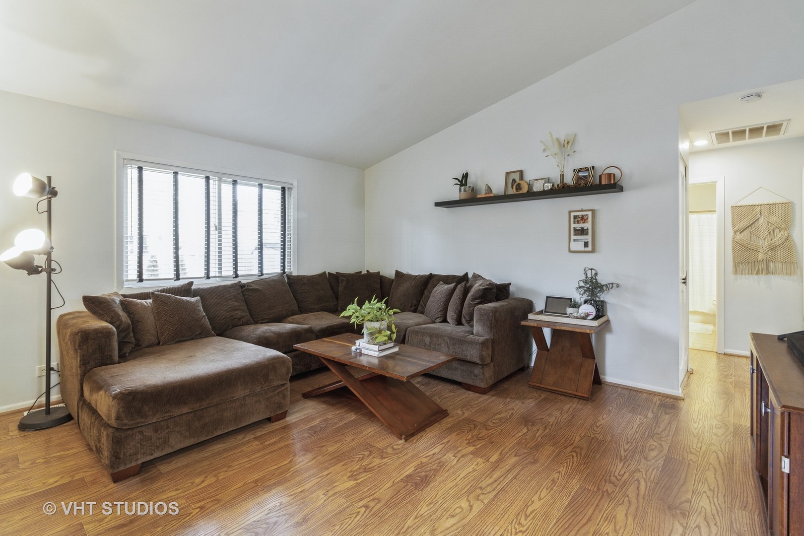 105 Cedarbrook Road Naperville, IL 60565 - Photo 3 of 11 a living room with furniture and a wooden floor