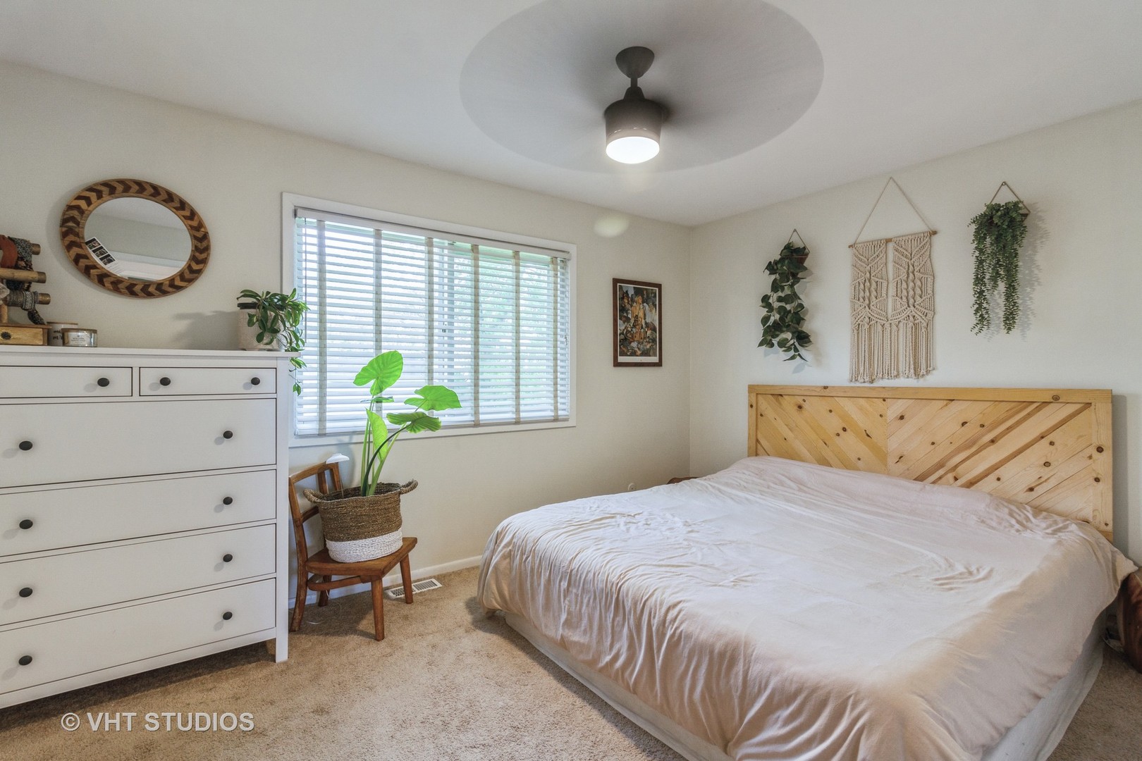 105 Cedarbrook Road Naperville, IL 60565 - Photo 6 of 11 a bedroom with a bed and a dresser