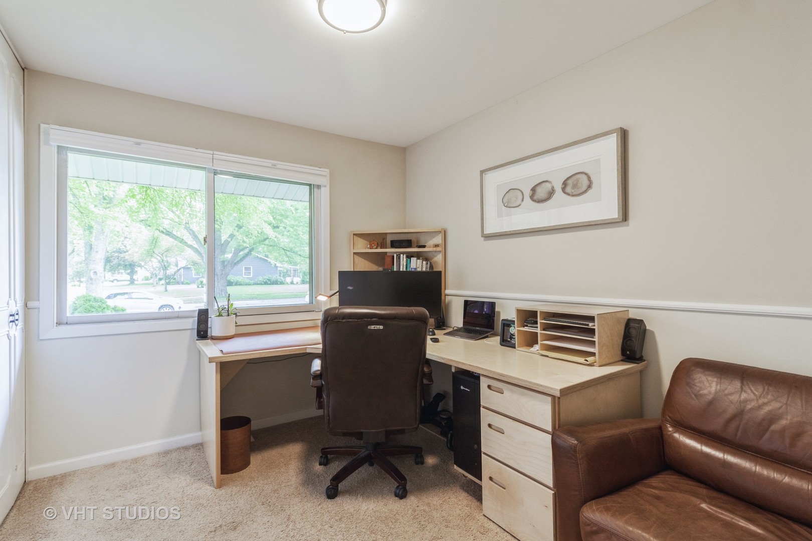 105 Cedarbrook Road Naperville, IL 60565 - Photo 9 of 11 a room with furniture and a window