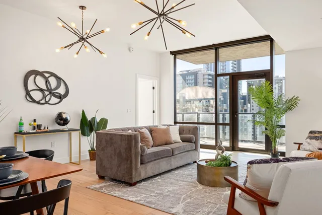 a living room with furniture and window
