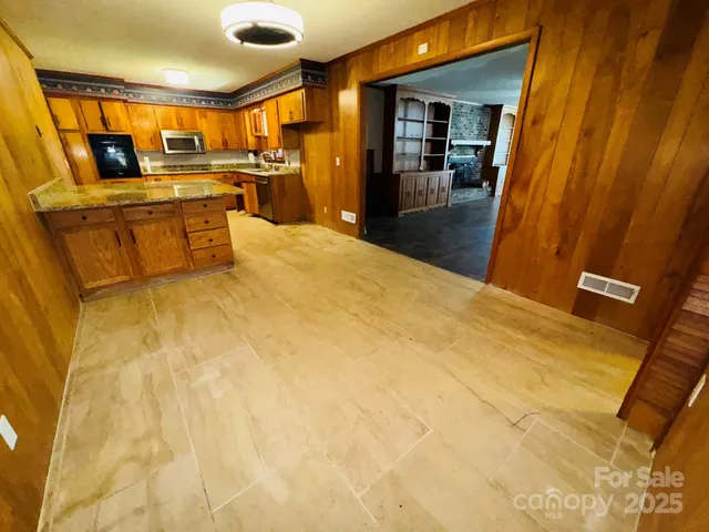 a bed room with a bed and furniture