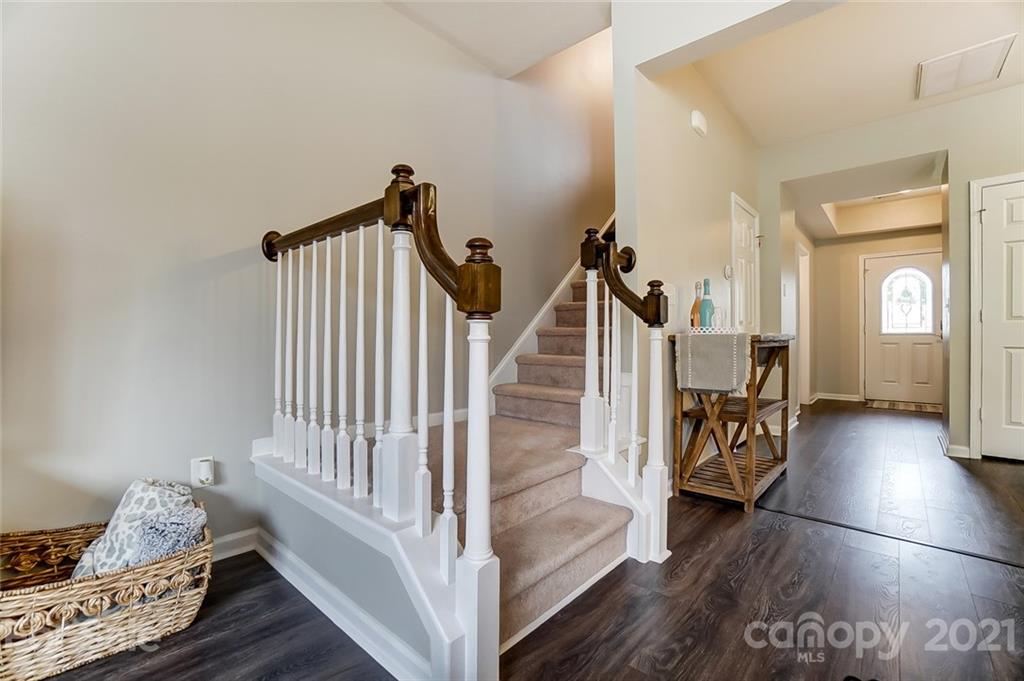 142 Council House Road Fort Mill, SC 29708 - Photo 18 of 32 a view of entryway and hall with wooden floor