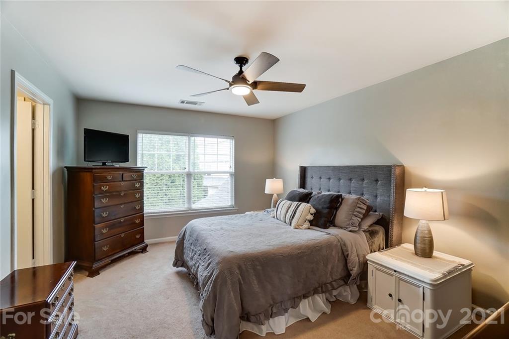 142 Council House Road Fort Mill, SC 29708 - Photo 21 of 32 a bedroom with a bed and a television
