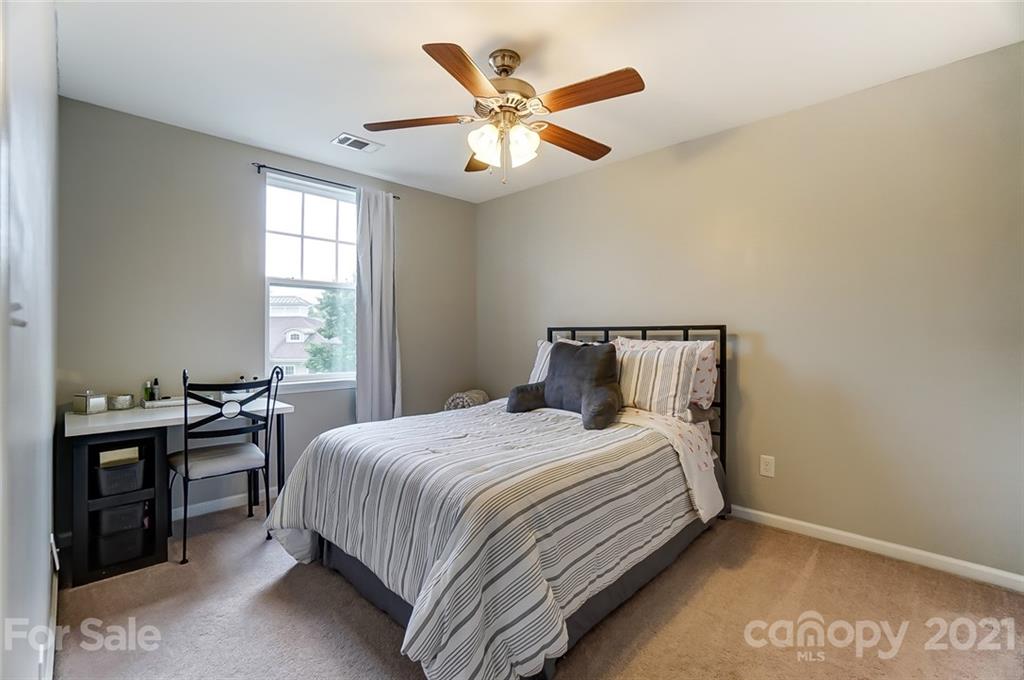 142 Council House Road Fort Mill, SC 29708 - Photo 25 of 32 a bedroom with a bed and window