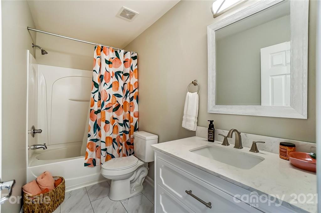 142 Council House Road Fort Mill, SC 29708 - Photo 27 of 32 a bathroom with a sink toilet and shower