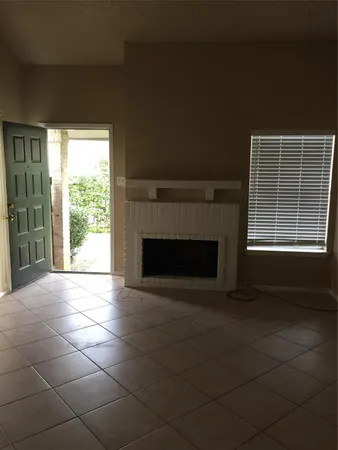 a view of cabinets and window