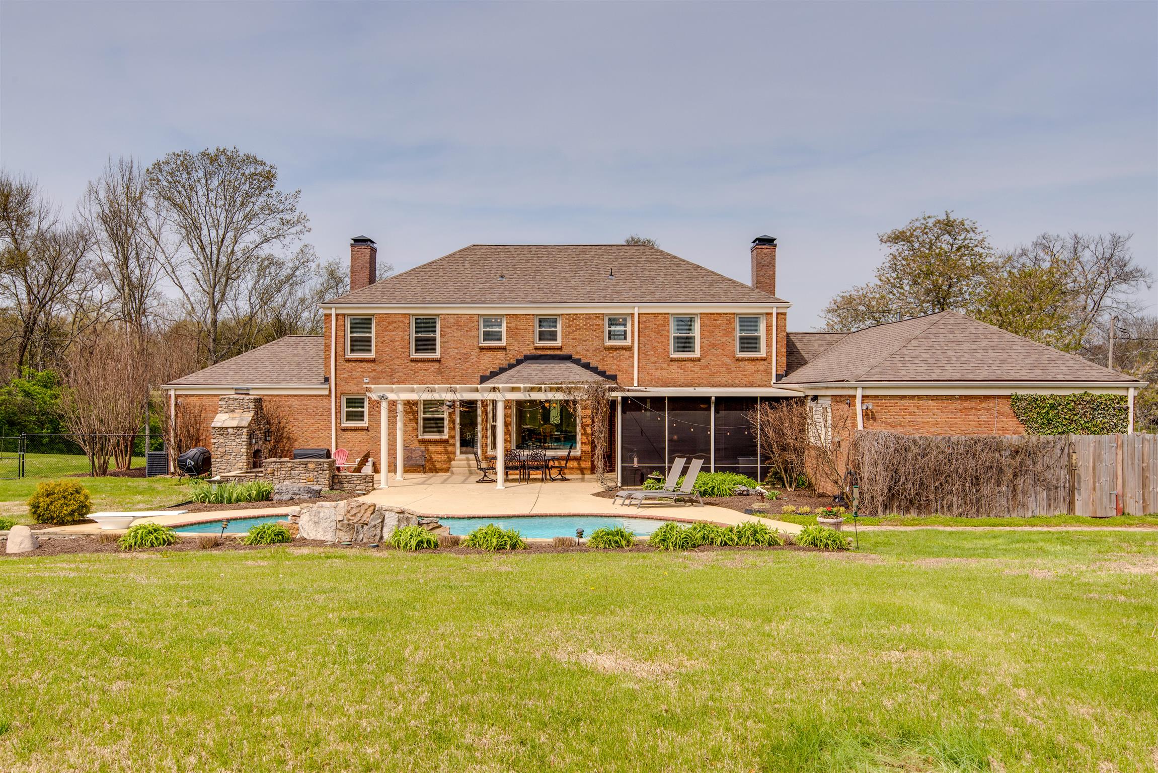 891 Sneed Road West Franklin, TN 37069 - Photo 23 of 30 a front view of a house with garden