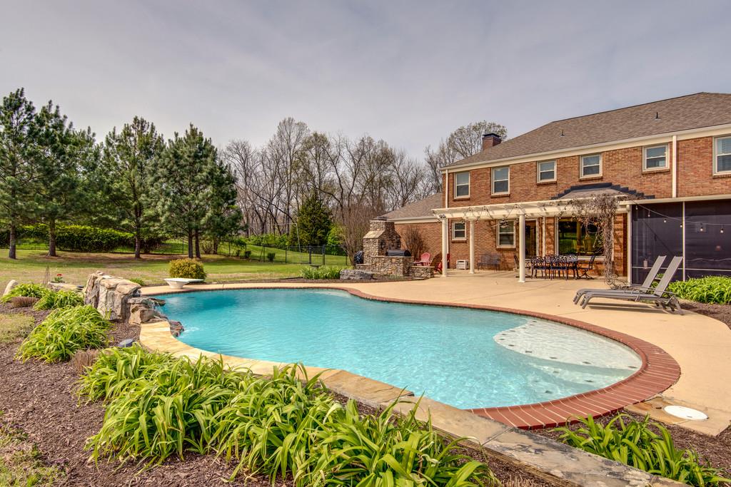 891 Sneed Road West Franklin, TN 37069 - Photo 24 of 30 swimming pool view with a outdoor seating space