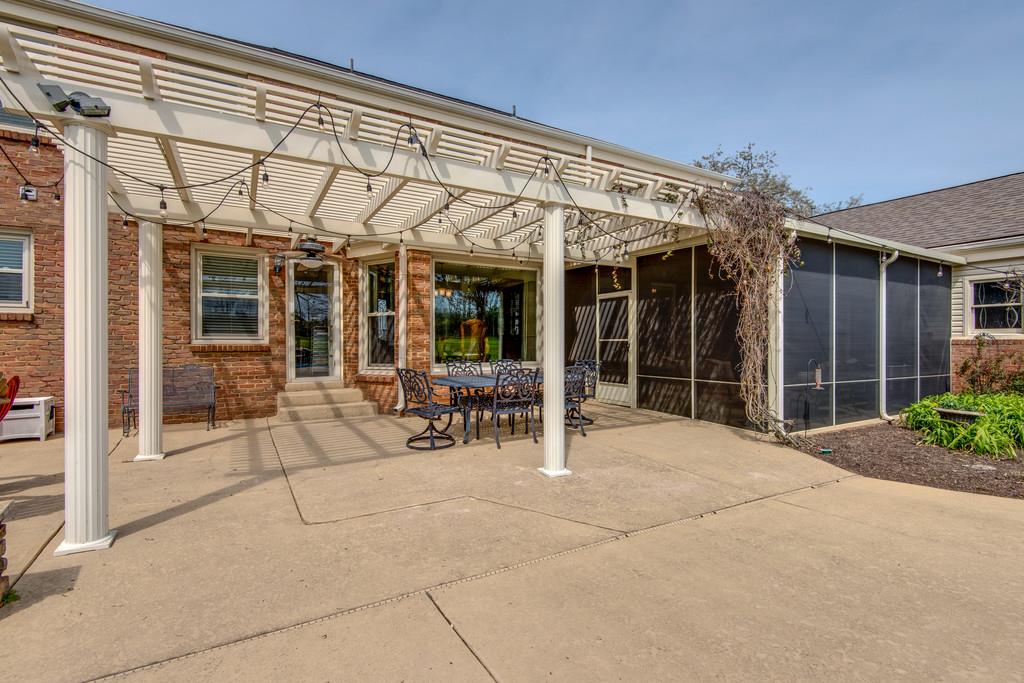 891 Sneed Road West Franklin, TN 37069 - Photo 27 of 30 front view of a building with a patio