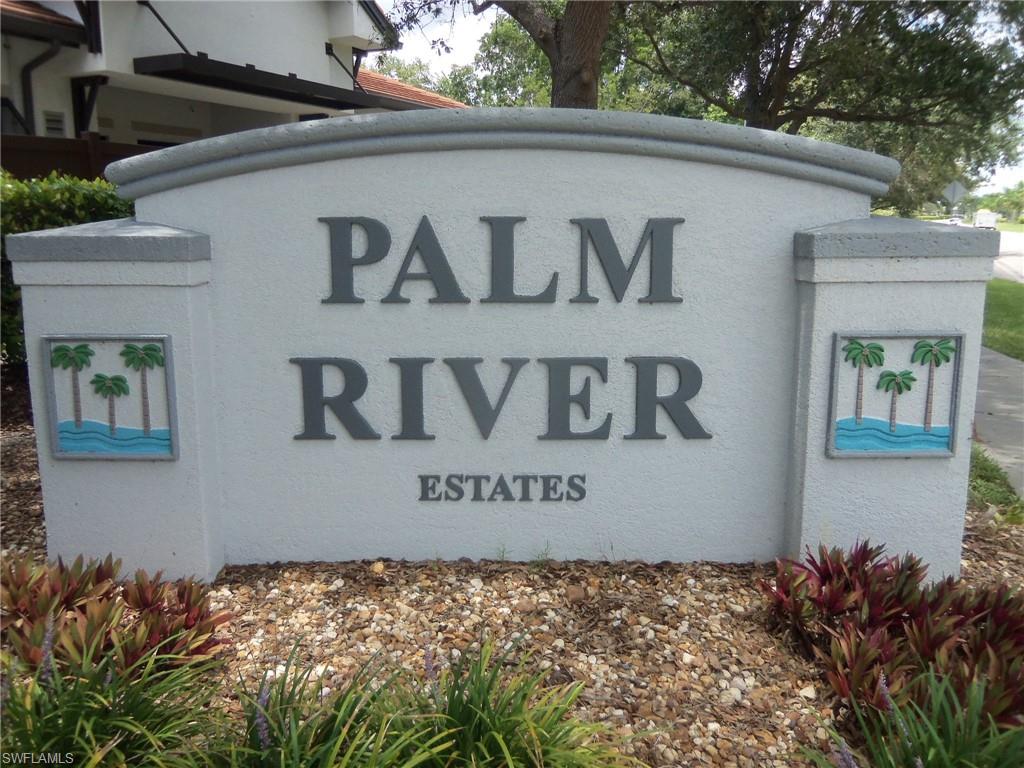 144 Cypress Way East, Unit 702 Naples, FL 34110 - Photo 18 of 18 a wall with a sign on it
