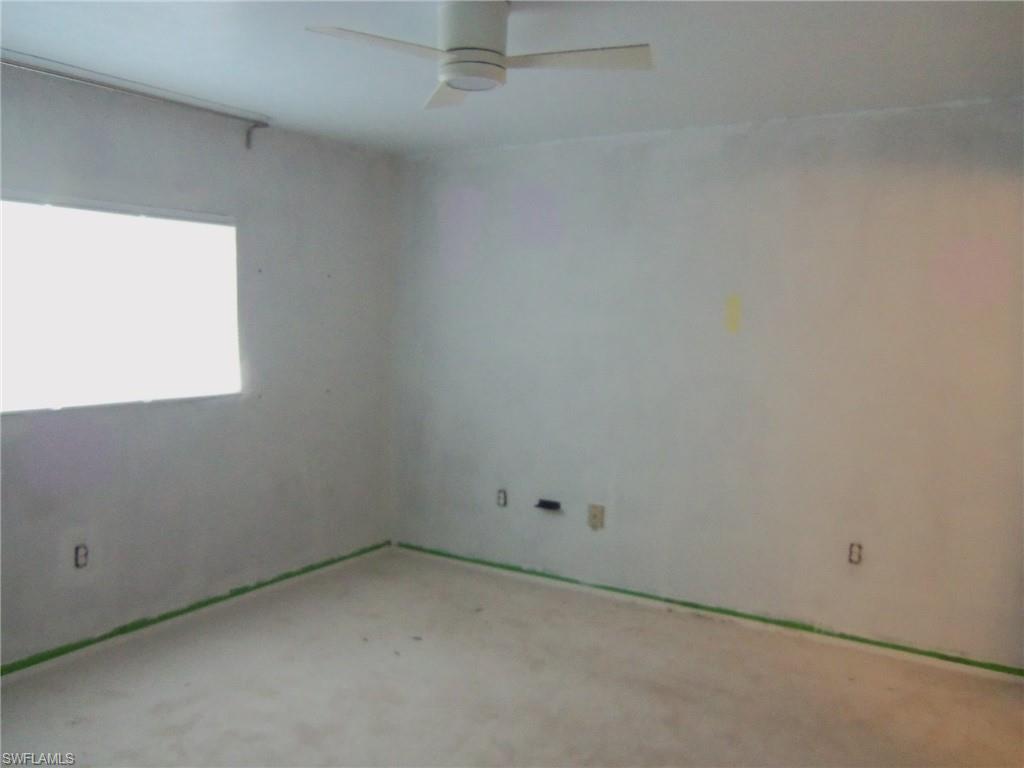 144 Cypress Way East, Unit 702 Naples, FL 34110 - Photo 5 of 18 a room