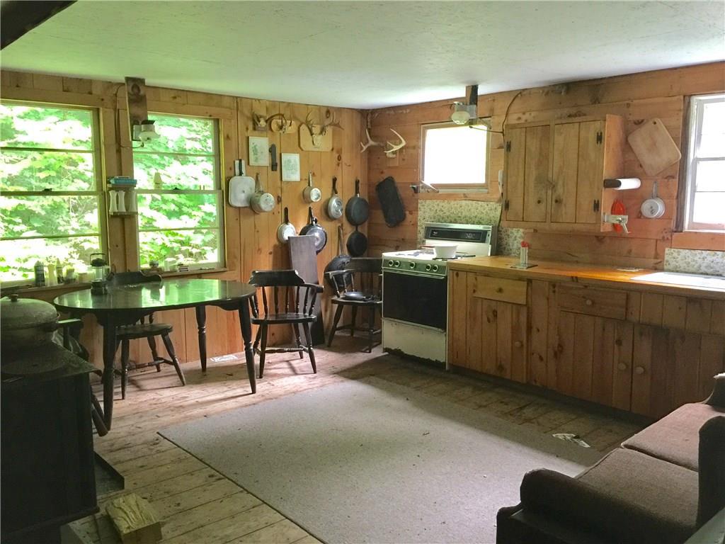 183 Weld Road Phillips, ME 04966 - Photo 9 of 21 open kitchen, living & dining