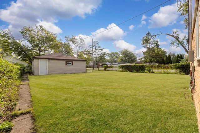 a view of a big room with table and chairs
