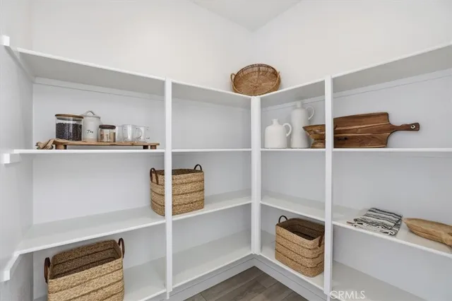 a view of a livingroom with furniture and closet